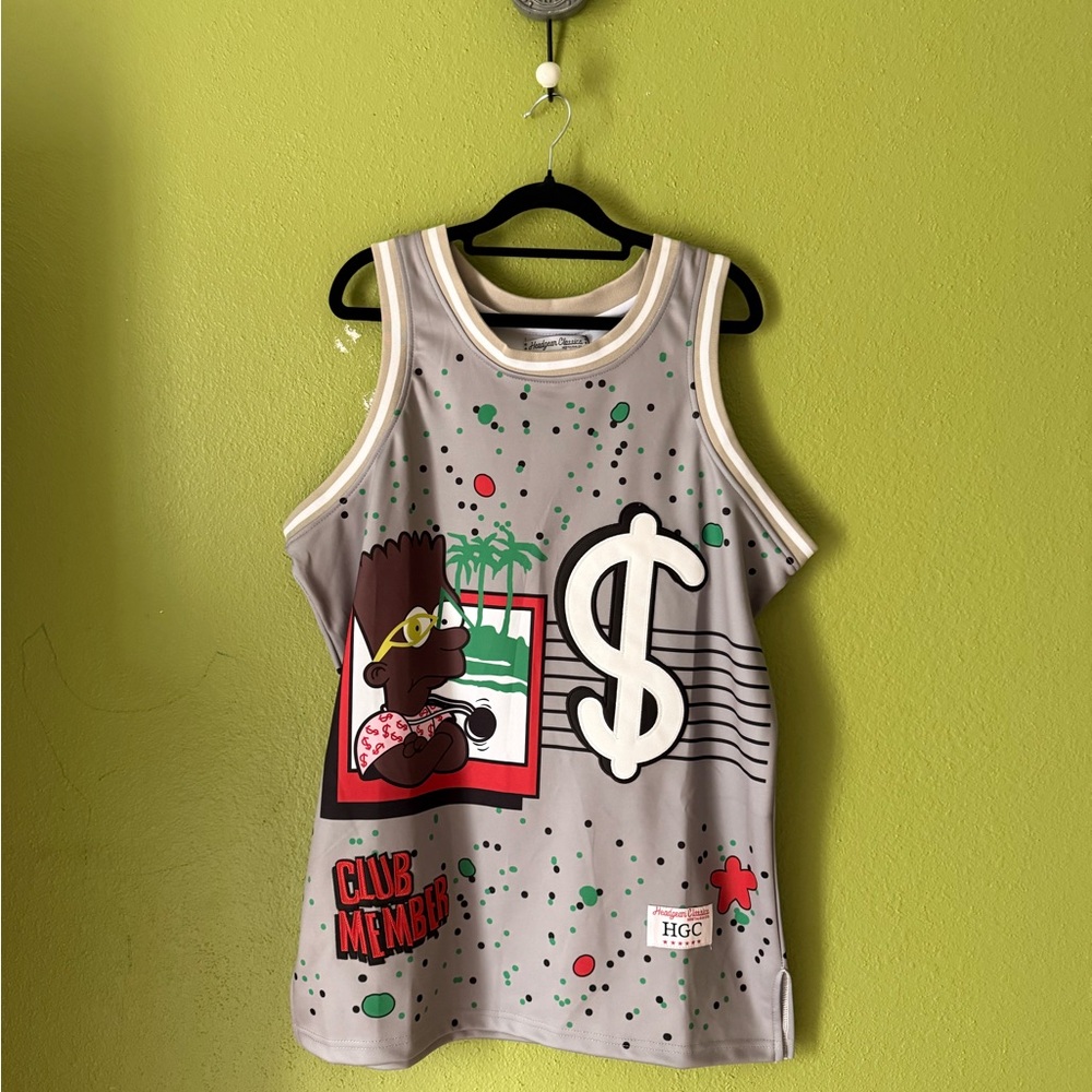 Size medium graphic embroidered jersey.